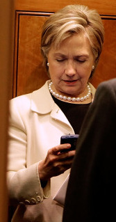 Hillary, 21st Century E-diplomat texting to help People in need.